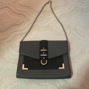 Grey and black Aldo envelope crossbody bag.